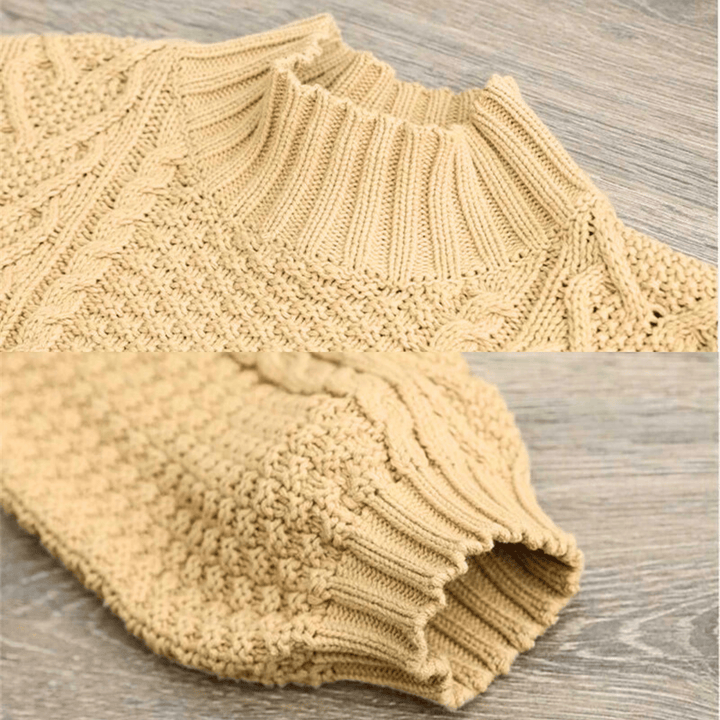 Gail - Women's chunky cable knit mock neck jumper in Sand – neck and cuff detail