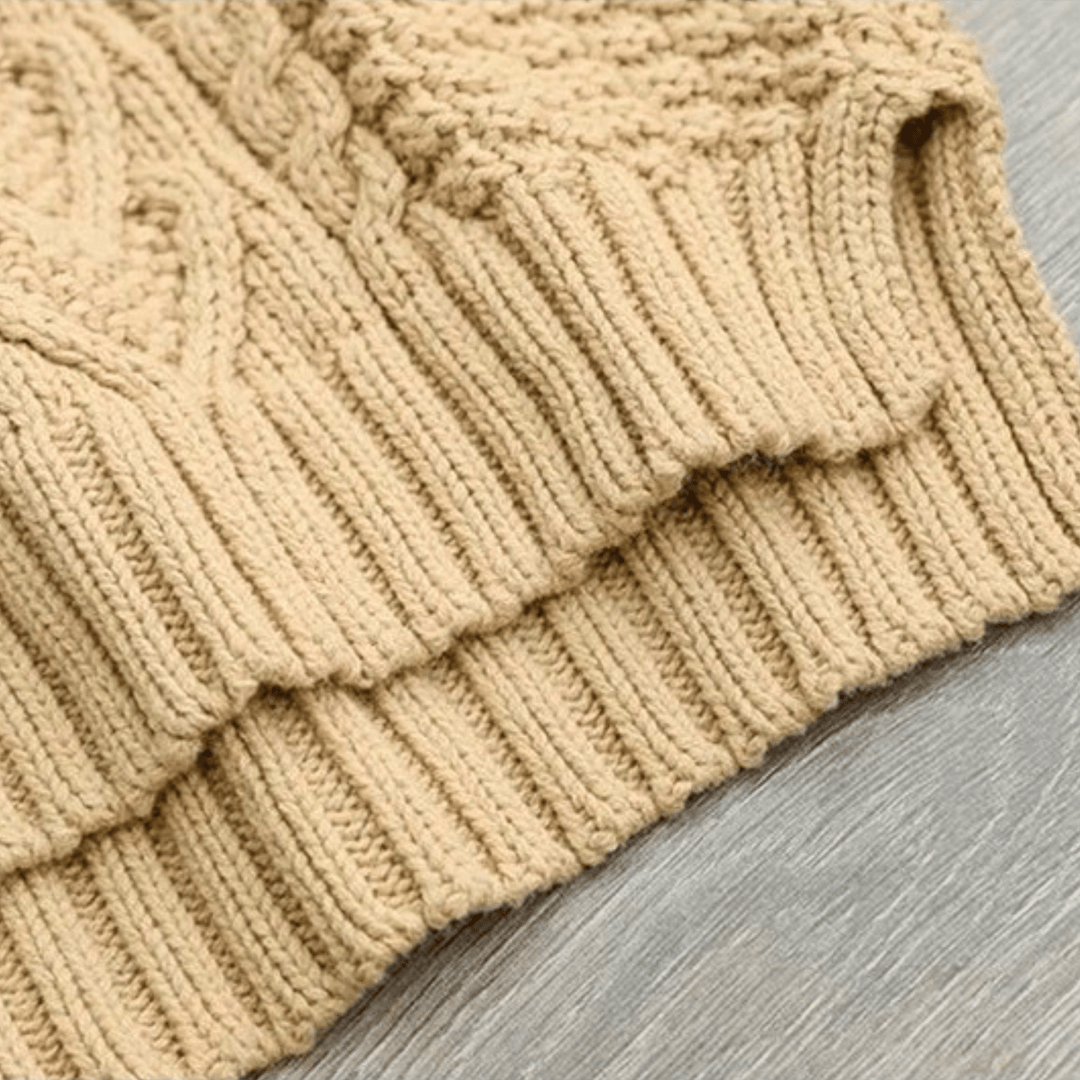 Gail - Women's chunky cable knit mock neck jumper in Sand – ribbed hem detail