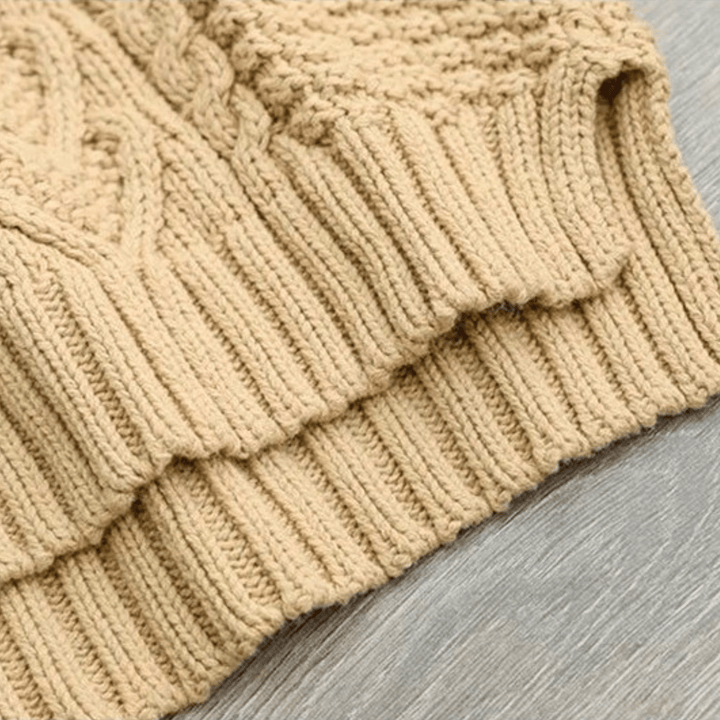 Gail - Women's chunky cable knit mock neck jumper in Sand – ribbed hem detail
