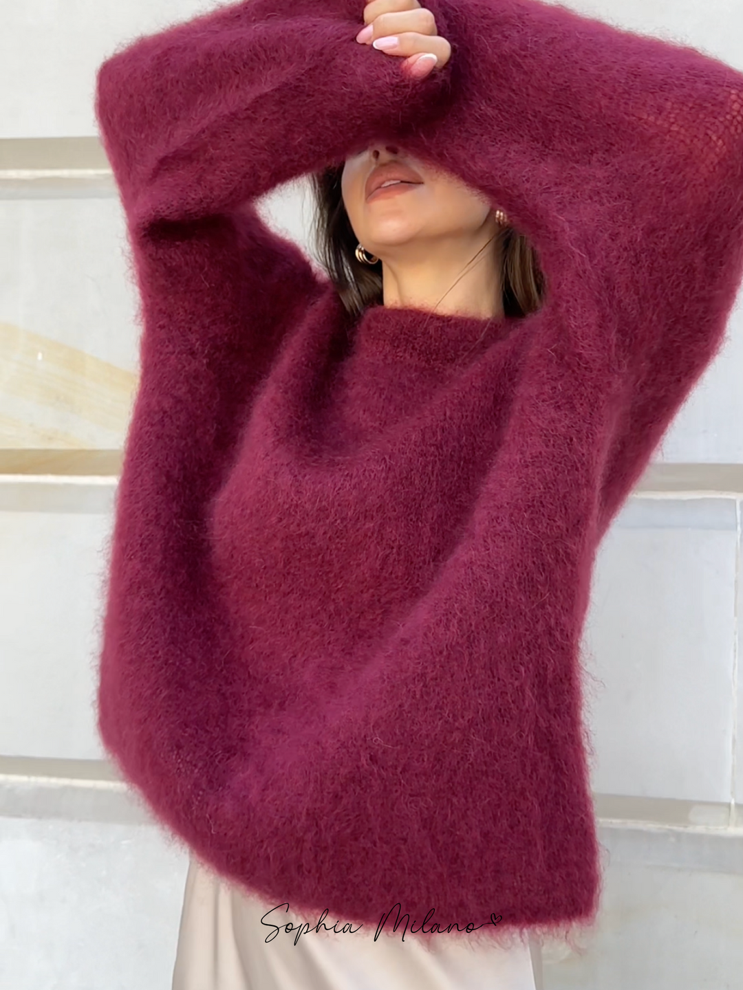 Women's fluffy knit crew neck jumper Darcey in Burgundy – arms raised view