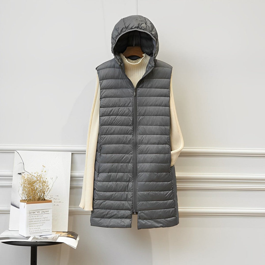 Women's long quilted gilet Ernestina in Grey – front view on hanger