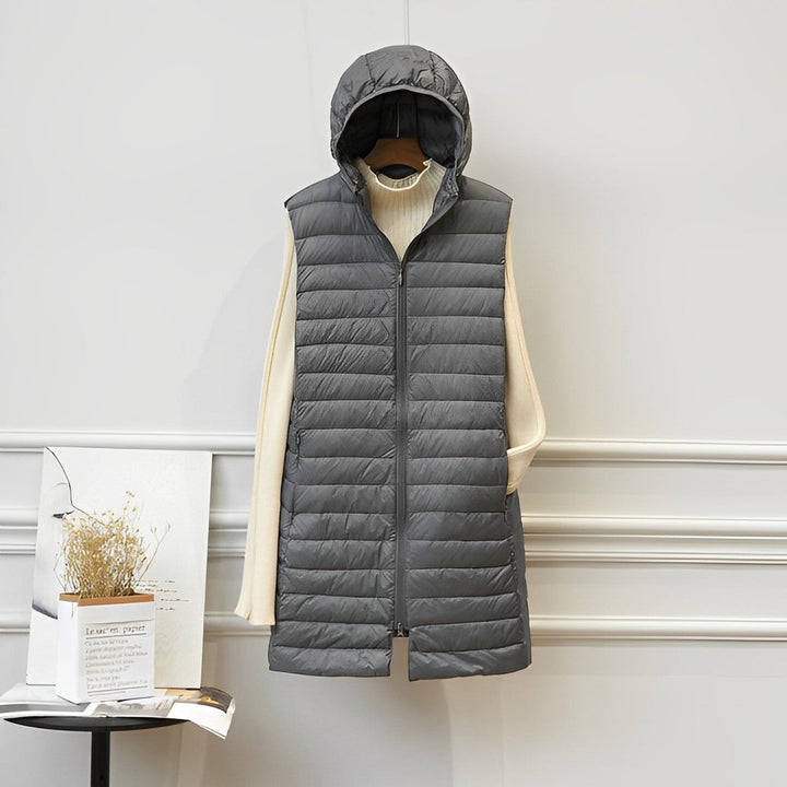 Women's long quilted gilet Ernestina in Grey – front view on hanger